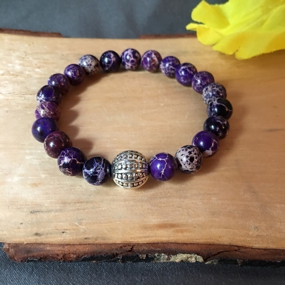 Purple jasper stretch beaded hand crafted bracelet with silver focal stone